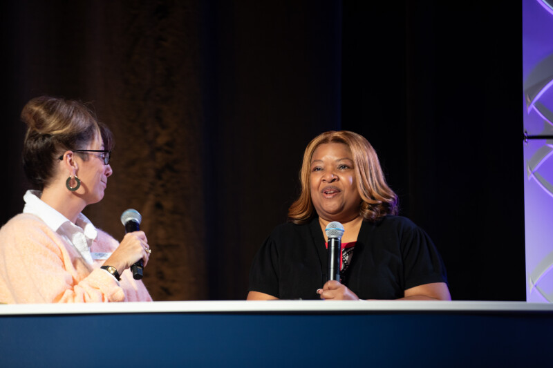 Executive Assistant Garnet Valliere (L) interviewing Kathy Adams (R)